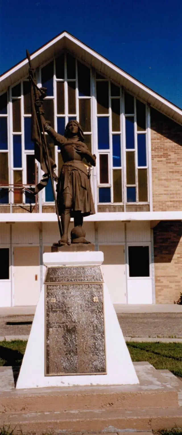 Joan of Arc statue in front of St. Joan of Arc Church
